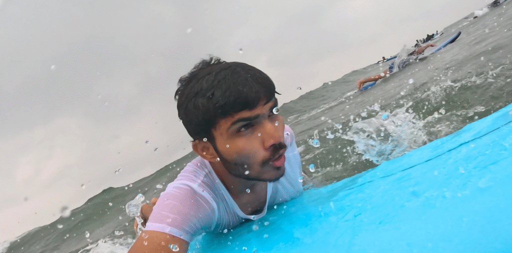 Surfer catching the wave