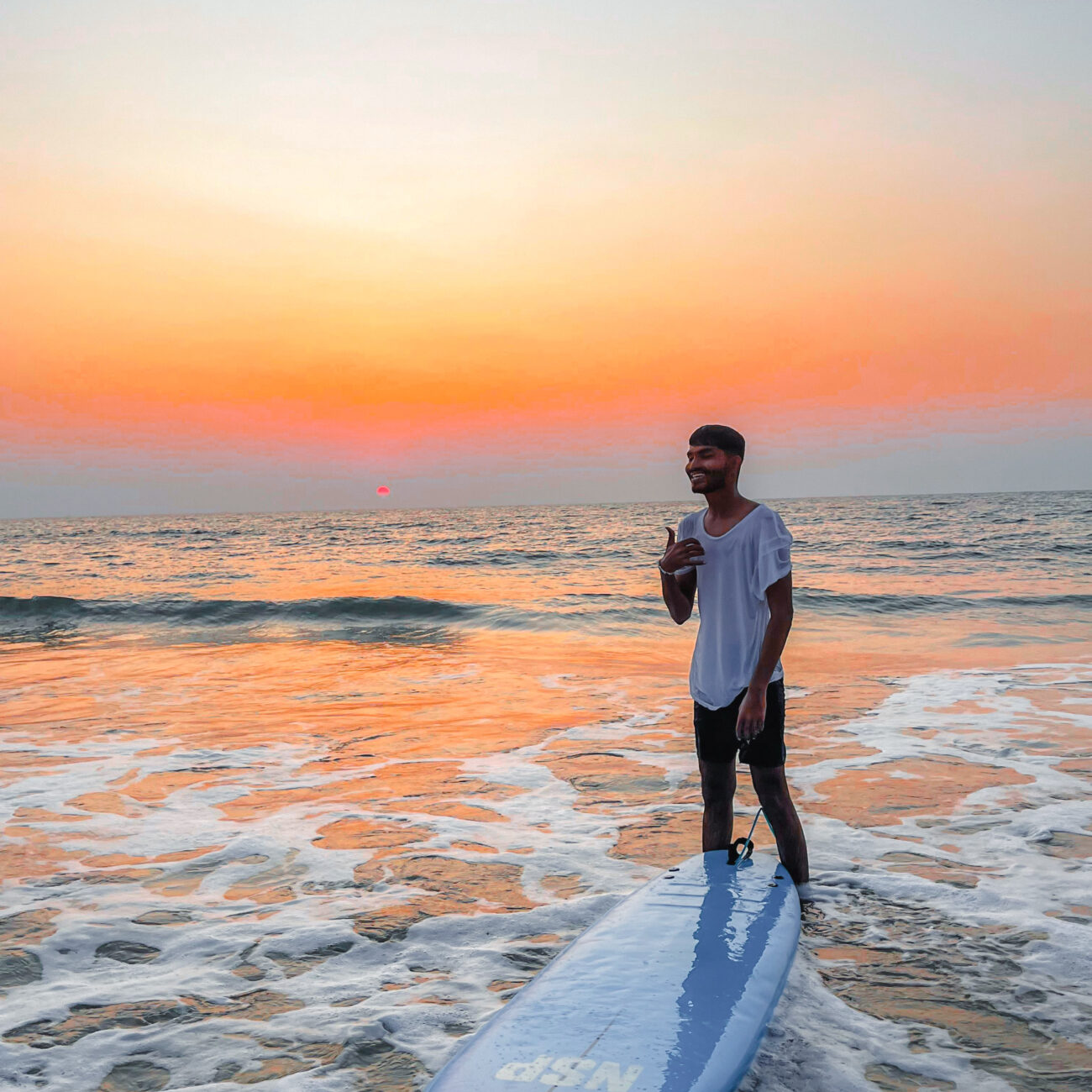 Sunset after evening surfing in Mulki