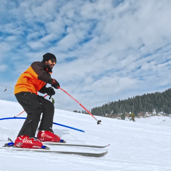 Pro skier doing slalom in snow skiing Gulmarg.